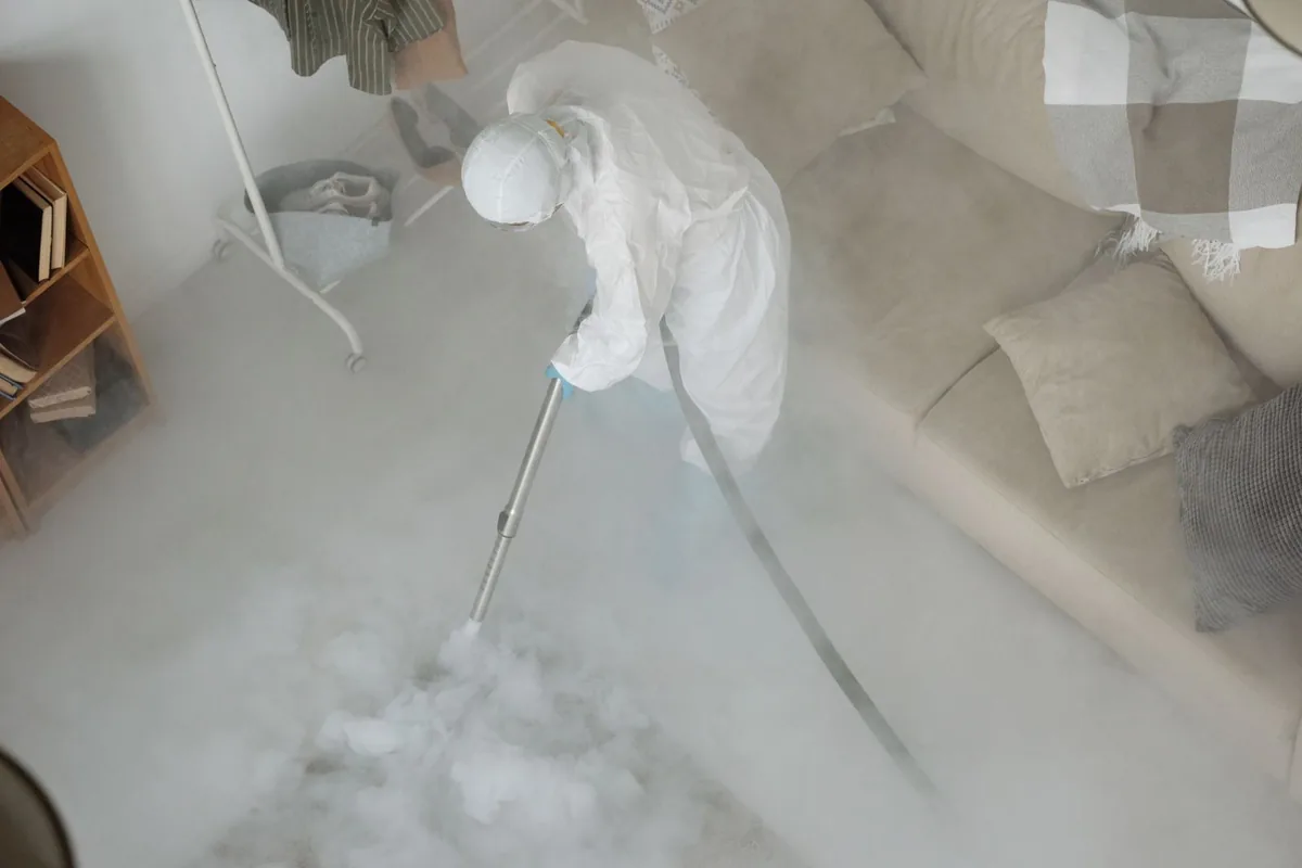 Biohazard cleanup technician in protective equipment, Mount Vernon, WA